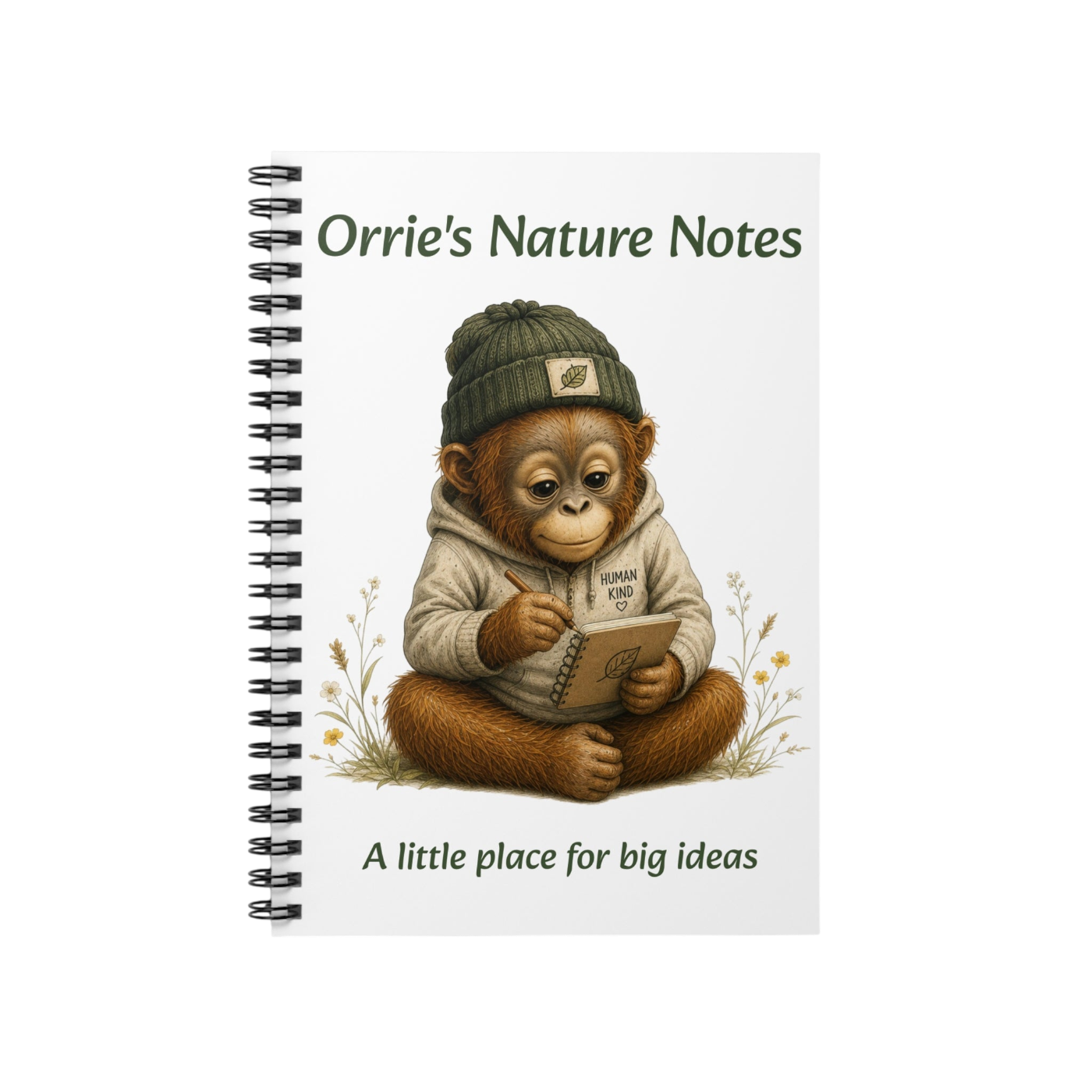 A spiral-bound notebook titled 'Orrie's Nature Notes' with an illustration of a brown monkey wearing a green beanie and white hoodie, sitting and reading. The notebook is shown on a plain white background.