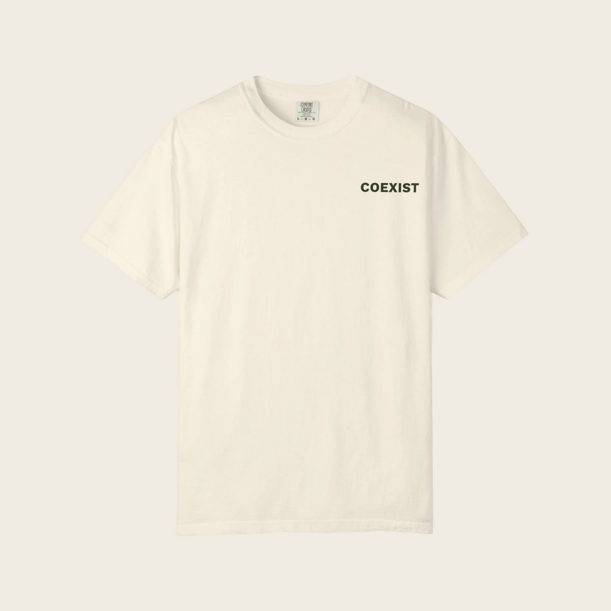 An off-white short-sleeve crewneck t-shirt with the word 'COEXIST' printed in black sans-serif font on the left chest, displayed against a solid off-white background.