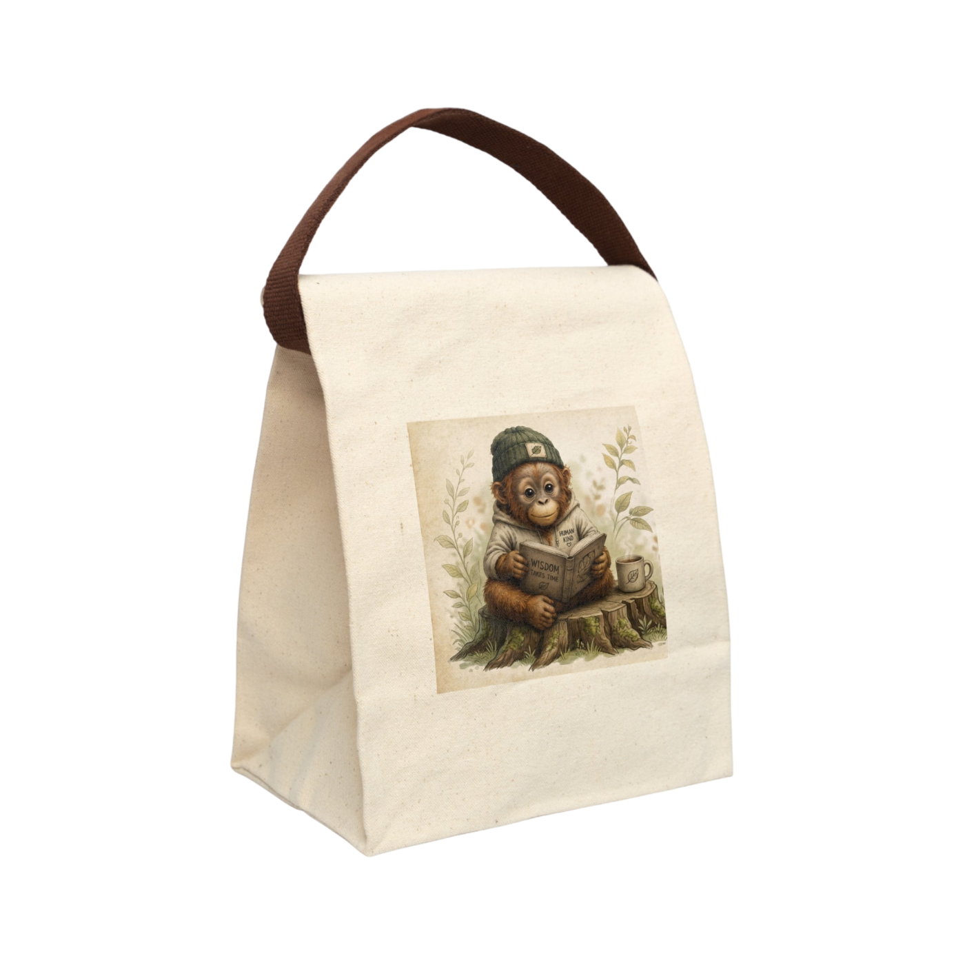 An off-white canvas lunch bag with a dark brown handle, featuring a vintage-style illustration of a teddy bear reading a book on the front.