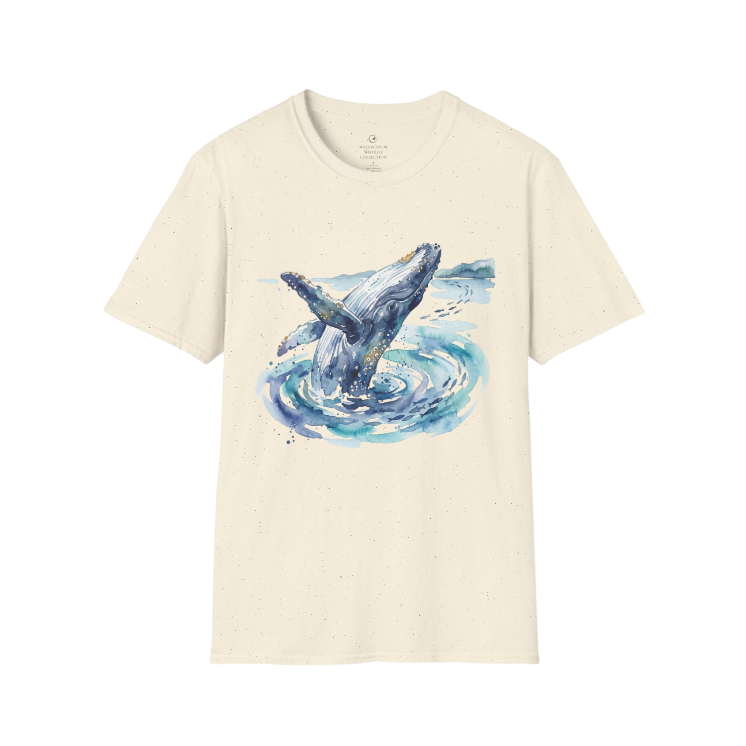An off-white short-sleeve t-shirt with a watercolor graphic of a humpback whale jumping out of blue water on the front, displayed against a solid white background.
