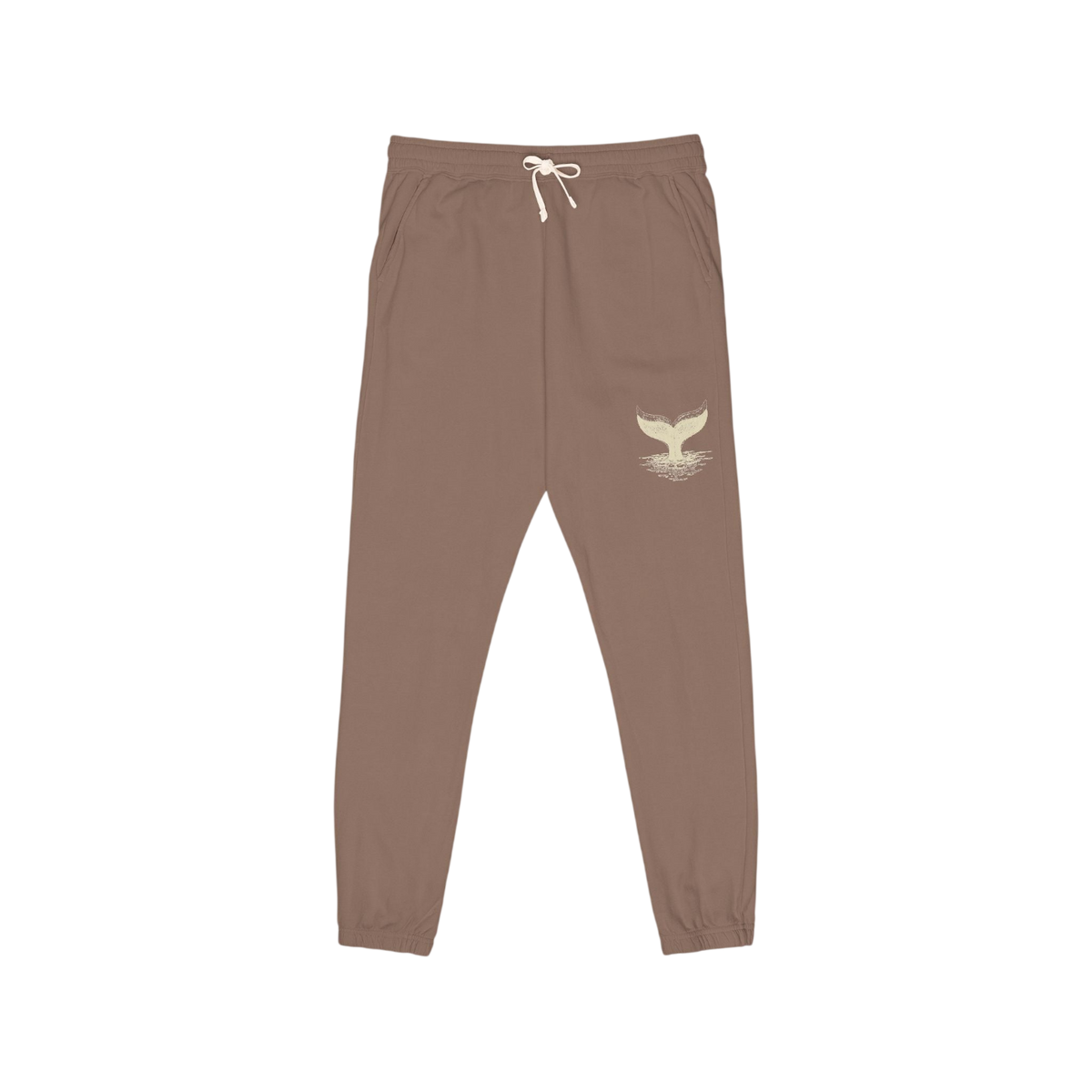 A pair of brown jogger pants with a white drawstring and a small white whale tail graphic on the left thigh, shown against a plain white background.
