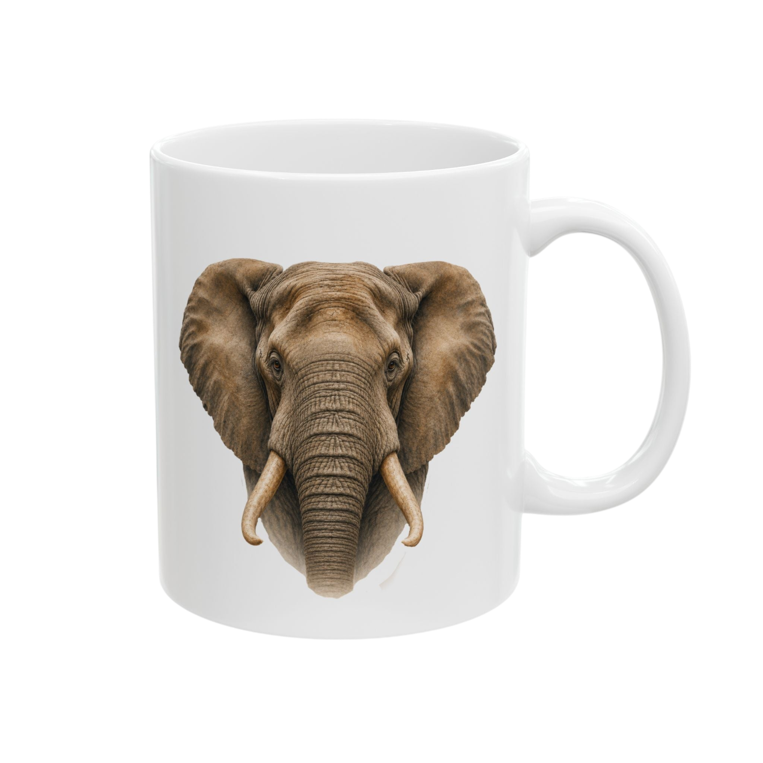 A white ceramic mug featuring a detailed graphic print of an elephant's head on the front, set against a plain white background.