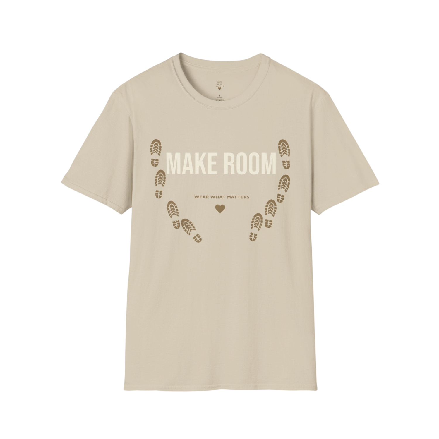 A beige short-sleeve crewneck t-shirt with a graphic on the front that reads 'MAKE ROOM' in white, with brown footprint outlines forming a heart shape around the text and the phrase 'WEAR WHAT MATTERS' below it.
