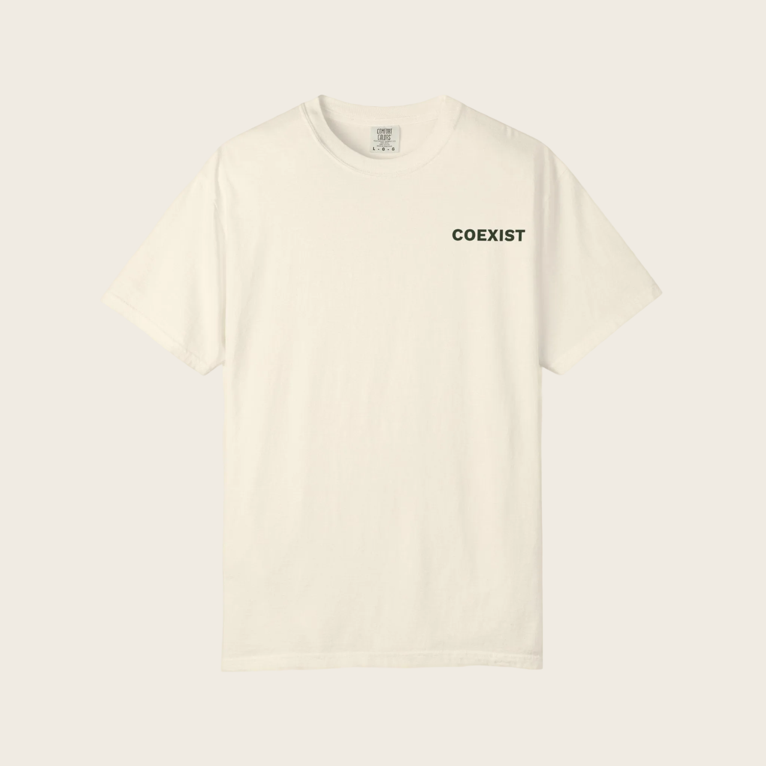 An off-white short-sleeve crewneck t-shirt with the word 'COEXIST' printed in black sans-serif font on the left chest, displayed against a solid off-white background.