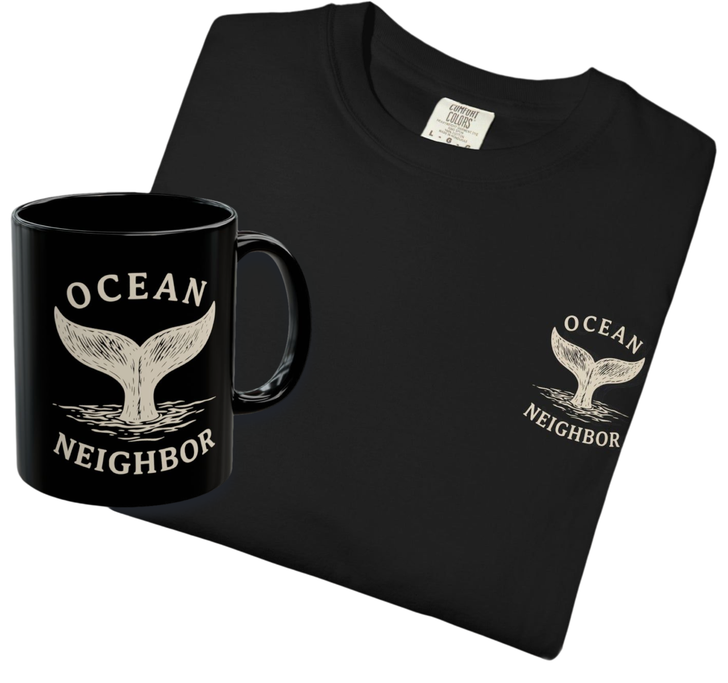 A black folded T-shirt and matching black mug with a white whale tail graphic and the words 'OCEAN NEIGHBOR' on a plain white background.