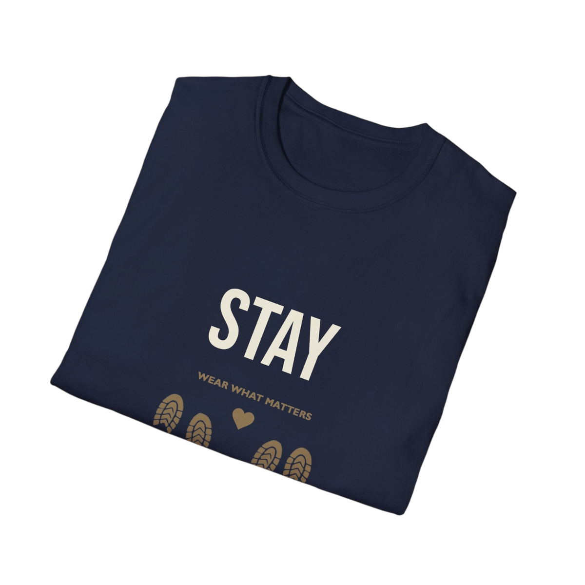 A navy blue folded t-shirt with a graphic print that reads 'STAY' in large white letters, 'WEAR WHAT MATTERS' in smaller gold text, and a row of gold footprint icons. The t-shirt is displayed on a clean white background.